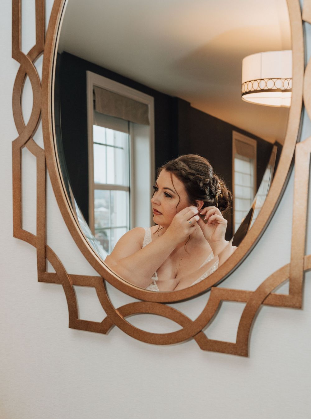 Yorktowne Hotel wedding in York, PA– Bride in Bridal suite getting ready portraits– elegant winter wedding