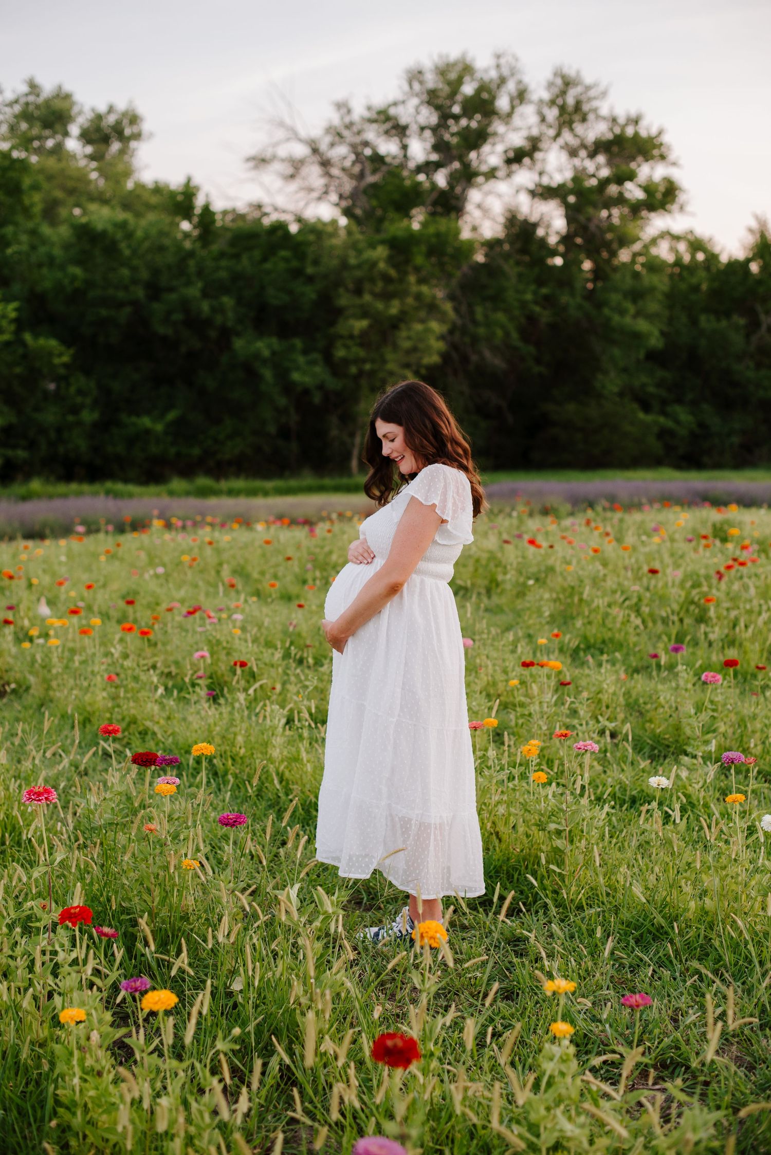 Flower field maternity session in Wichita Kansas by Jessica Nadine Photography