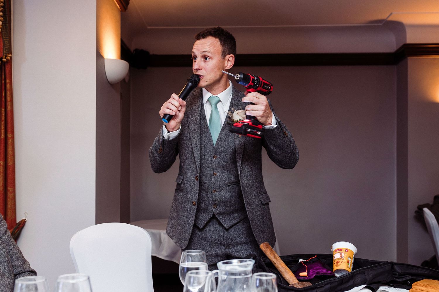 People toasting with champagne glasses at an elegant celebration event.