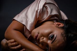 Artistic portrait series showing reclining figure in soft lighting. photography st louis.