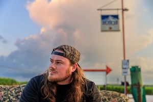 Panoramic sunset view of rural gas station and agricultural fields. photography st louis.