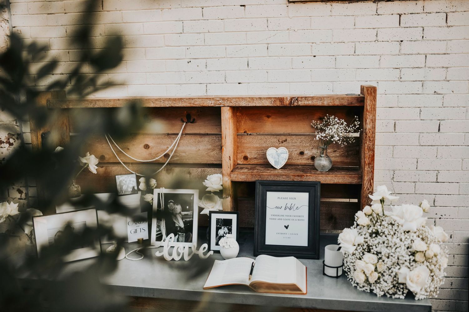 Wide shot of reception space styled for black-tie wedding