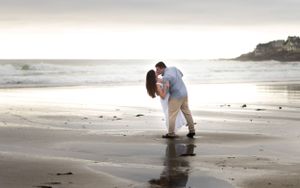 Engagement portrait captured by a Seacoast Maine, NH, MA, and Portsmouth New Hampshire wedding photographer. Nubble Lighthouse, York, Maine