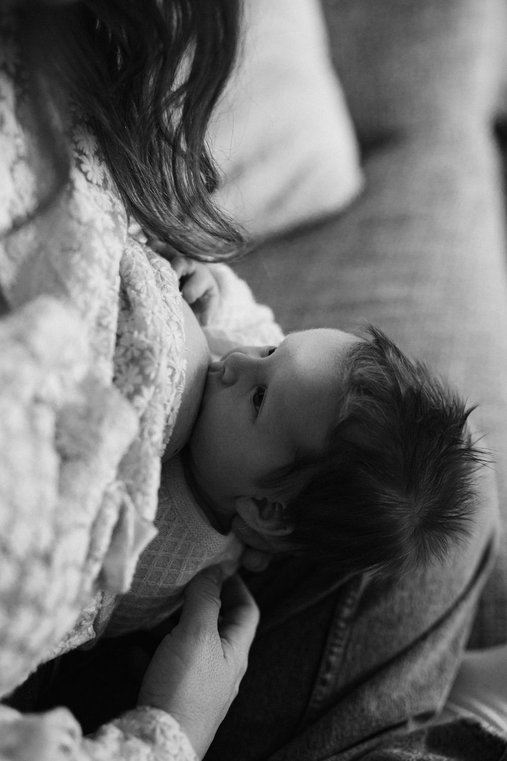 Black and white romantic photo sequence showing a tender kiss between two people in intimate close-up shots.