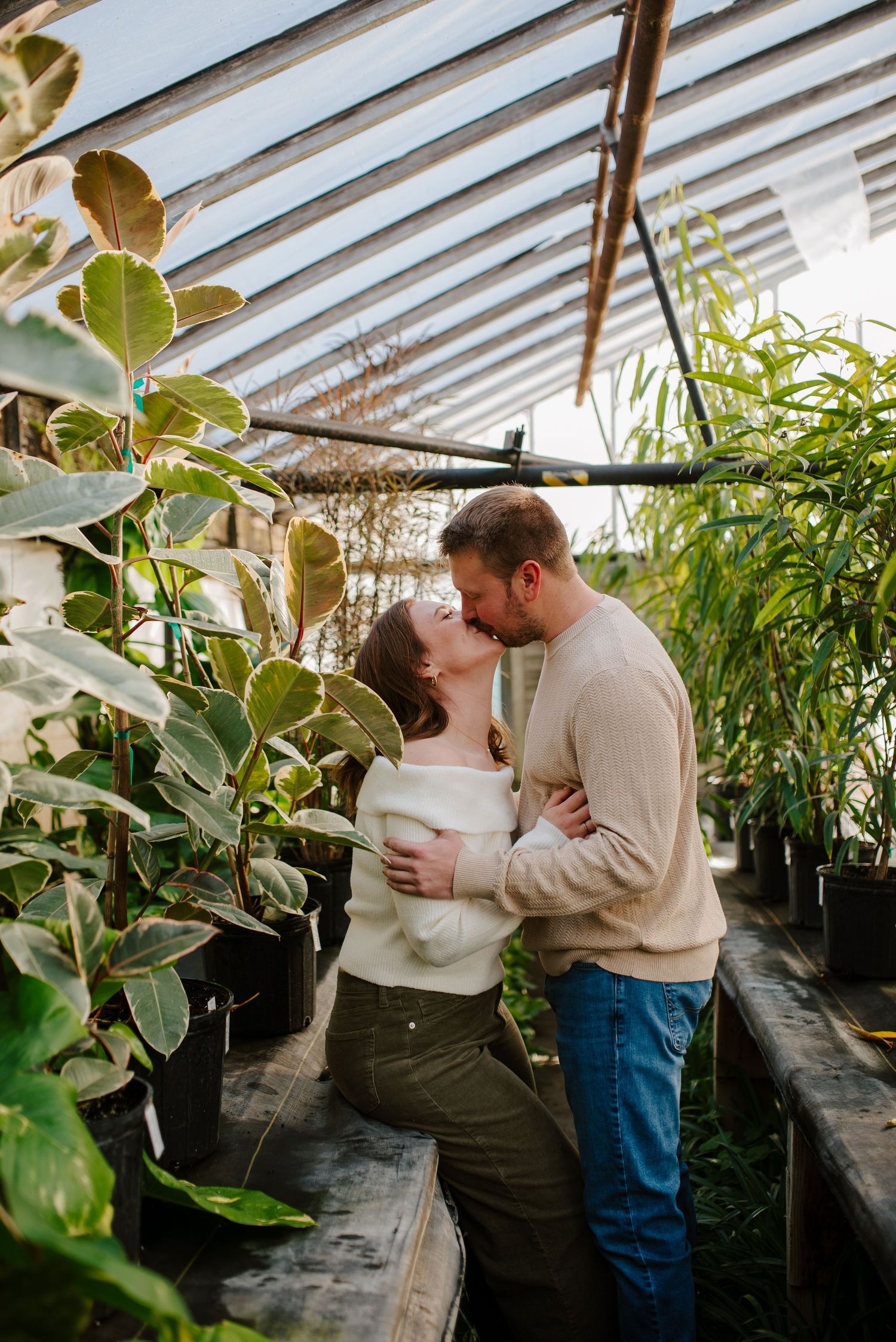 Greenhouse engagement session in Wichita, KS - Plant Kingdom engagement pictures by Jessica Nadine Photography