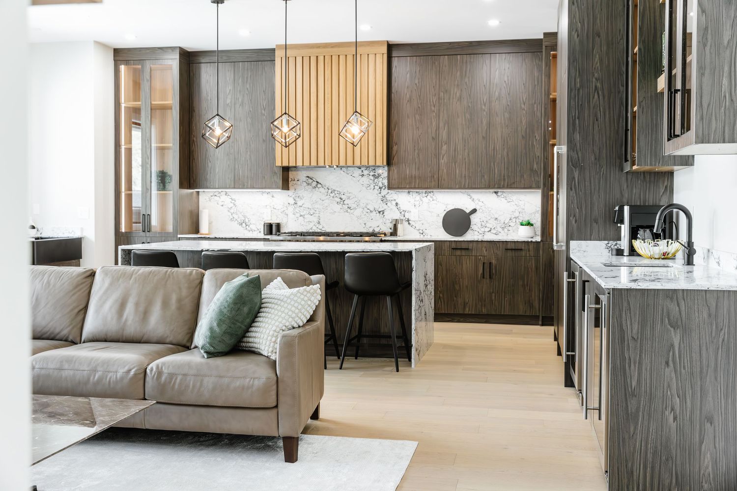 Open concept living space with modern furniture and wood accents in a west Kelowna Airbnb