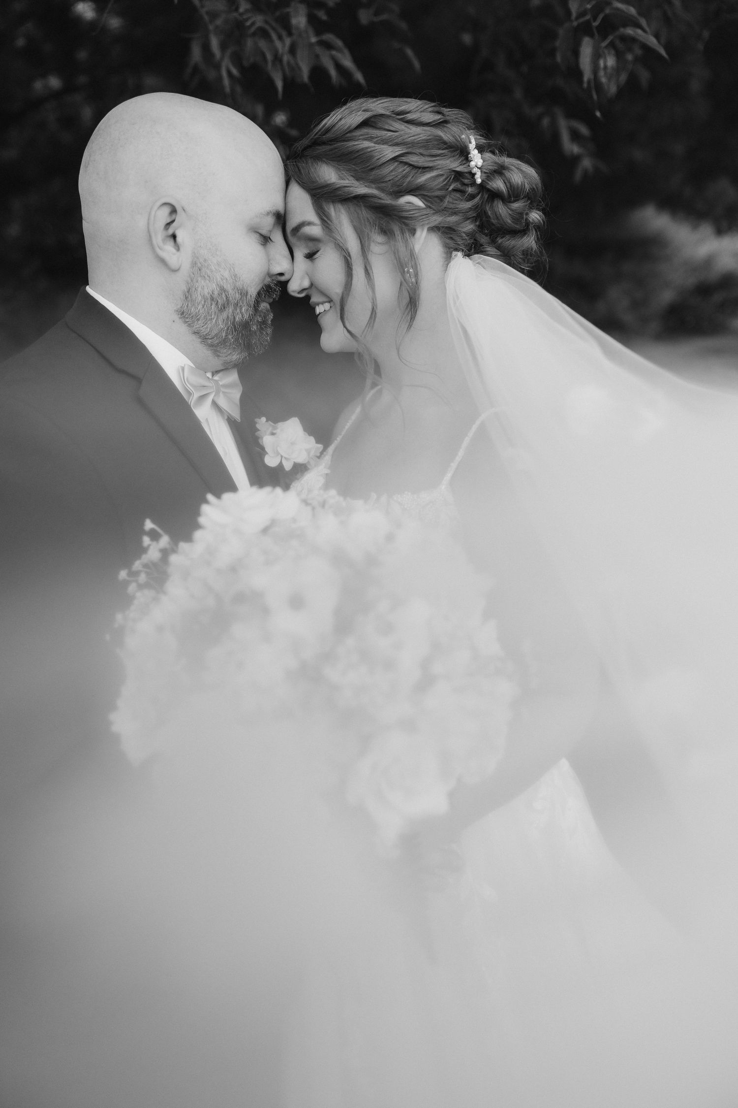 Bride and groom first kiss down the aisle