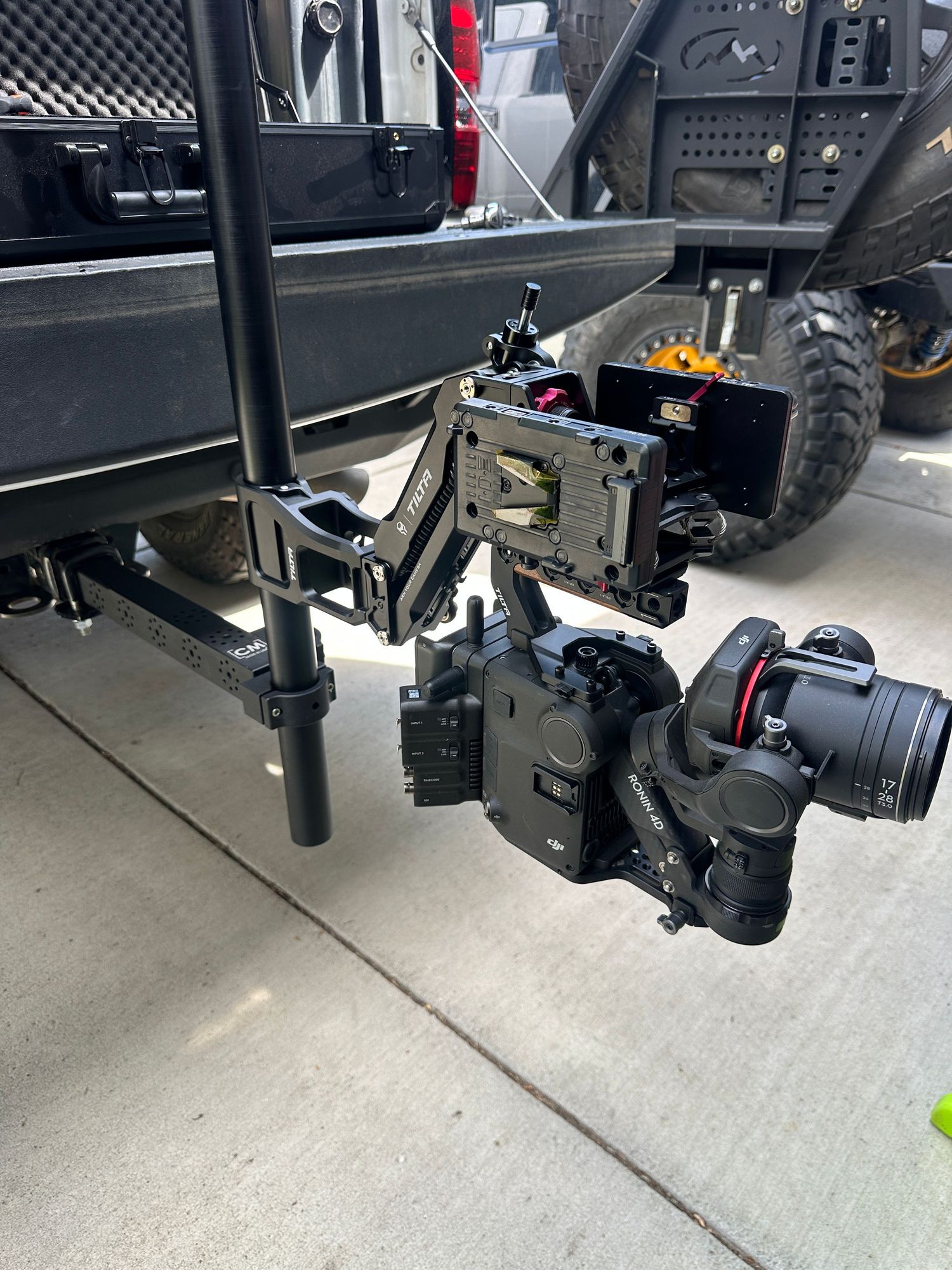 Close-up view of six black suspension and axle components showing mechanical details of vehicle undercarriage mounting points.