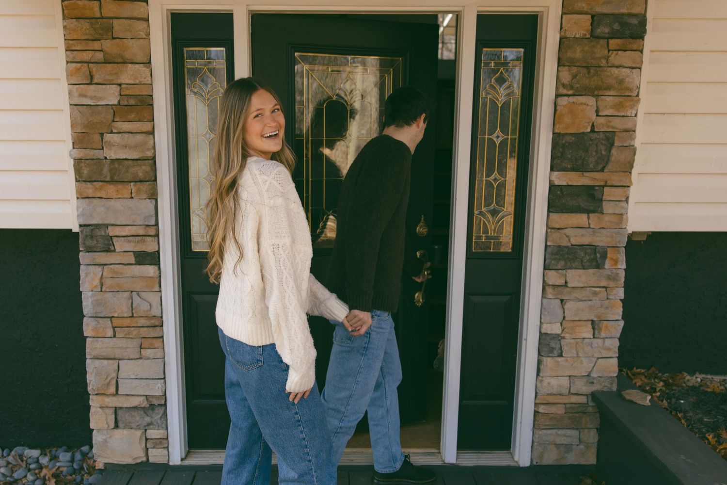 new home asheville photoshoot couples empty house lifestyle session front door celebrating