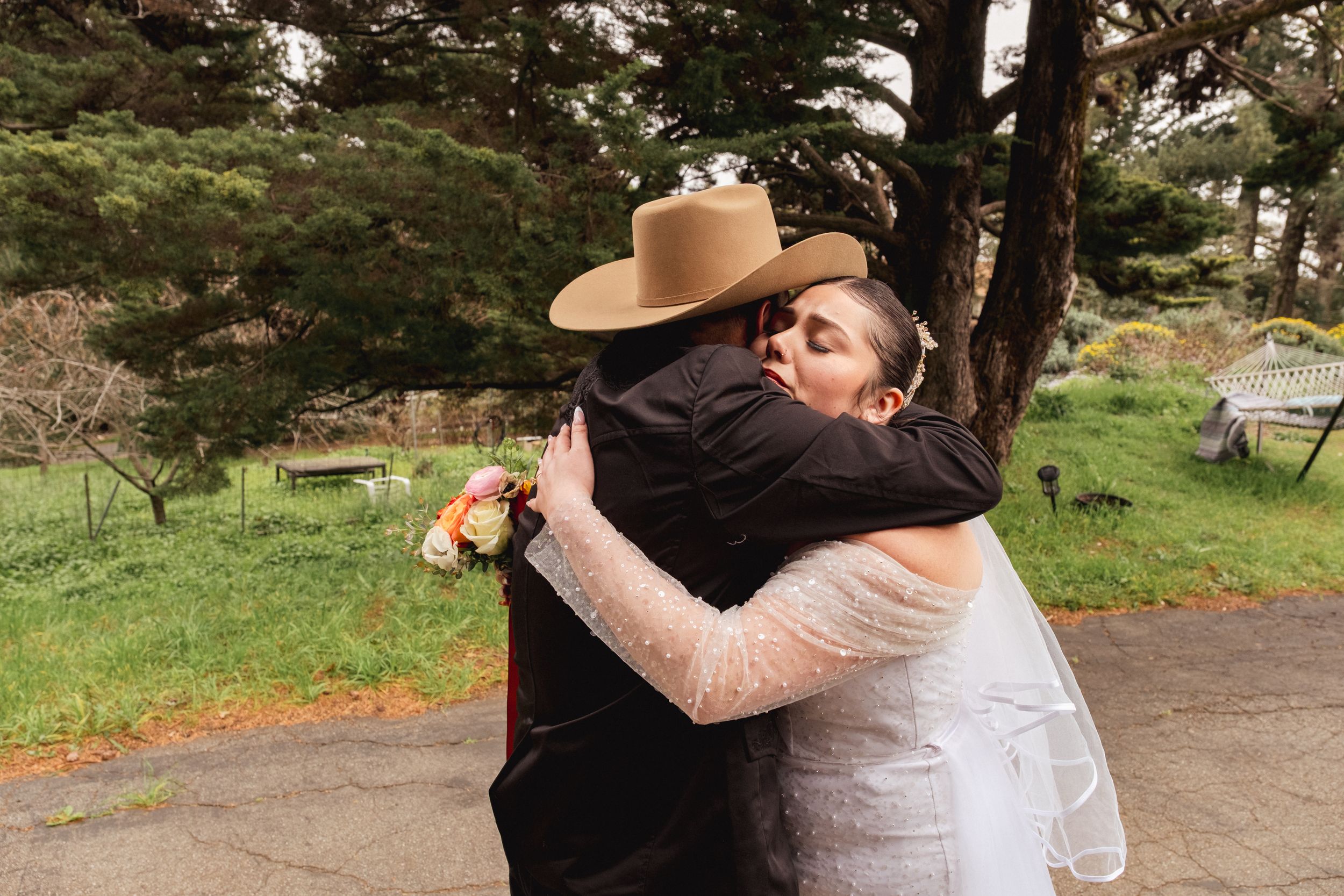 Bride hugging her father.