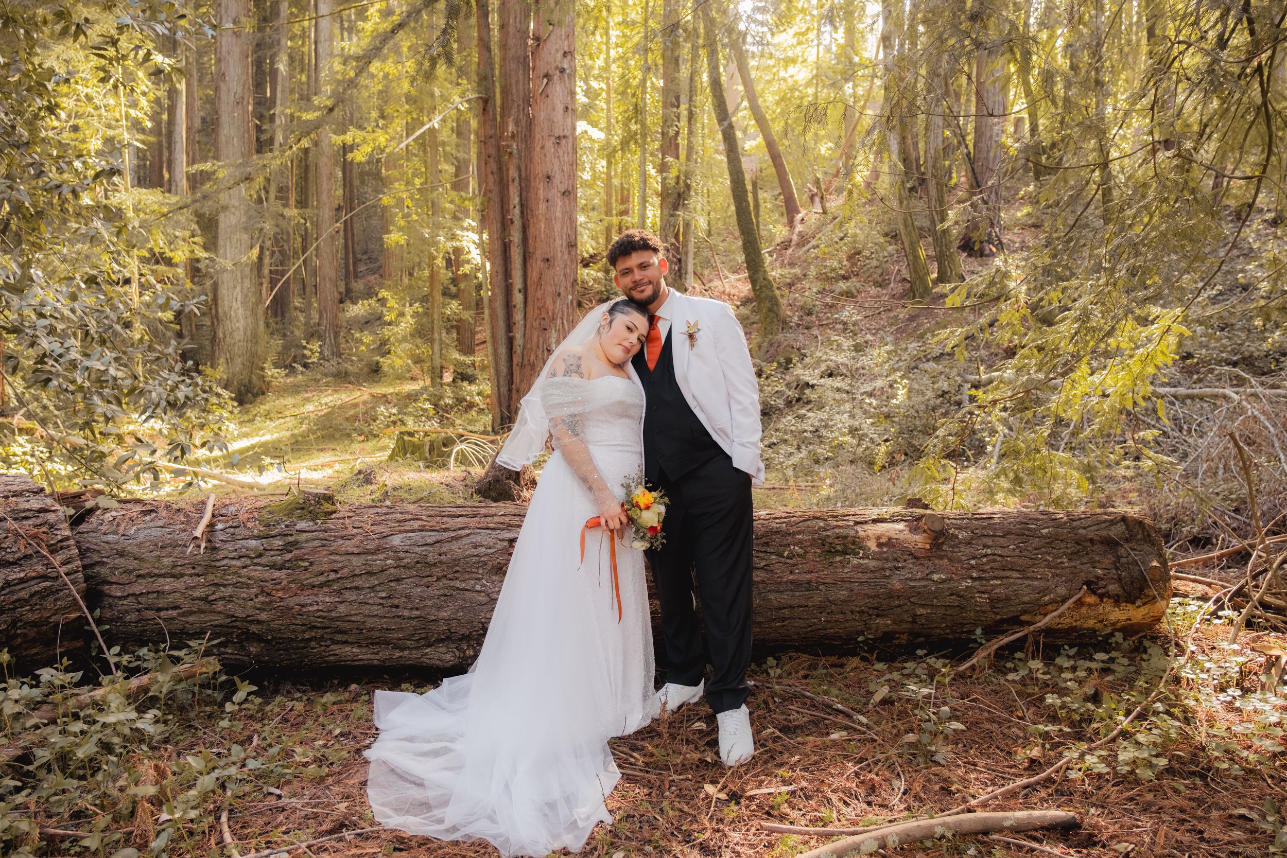 Just married couple in the redwoods.