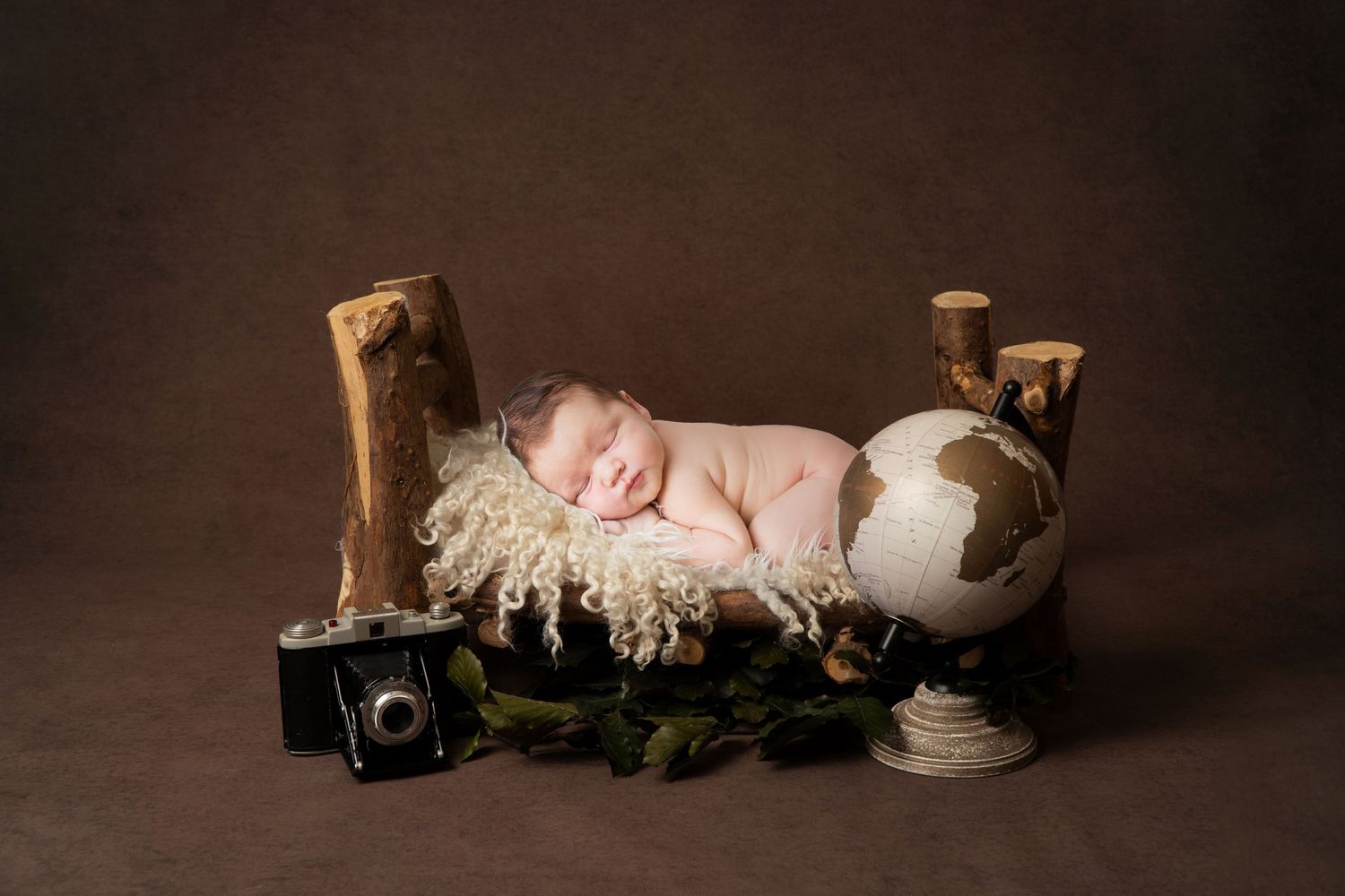 Fine art newborn photography Gold Coast using luxury hand-crafted props.