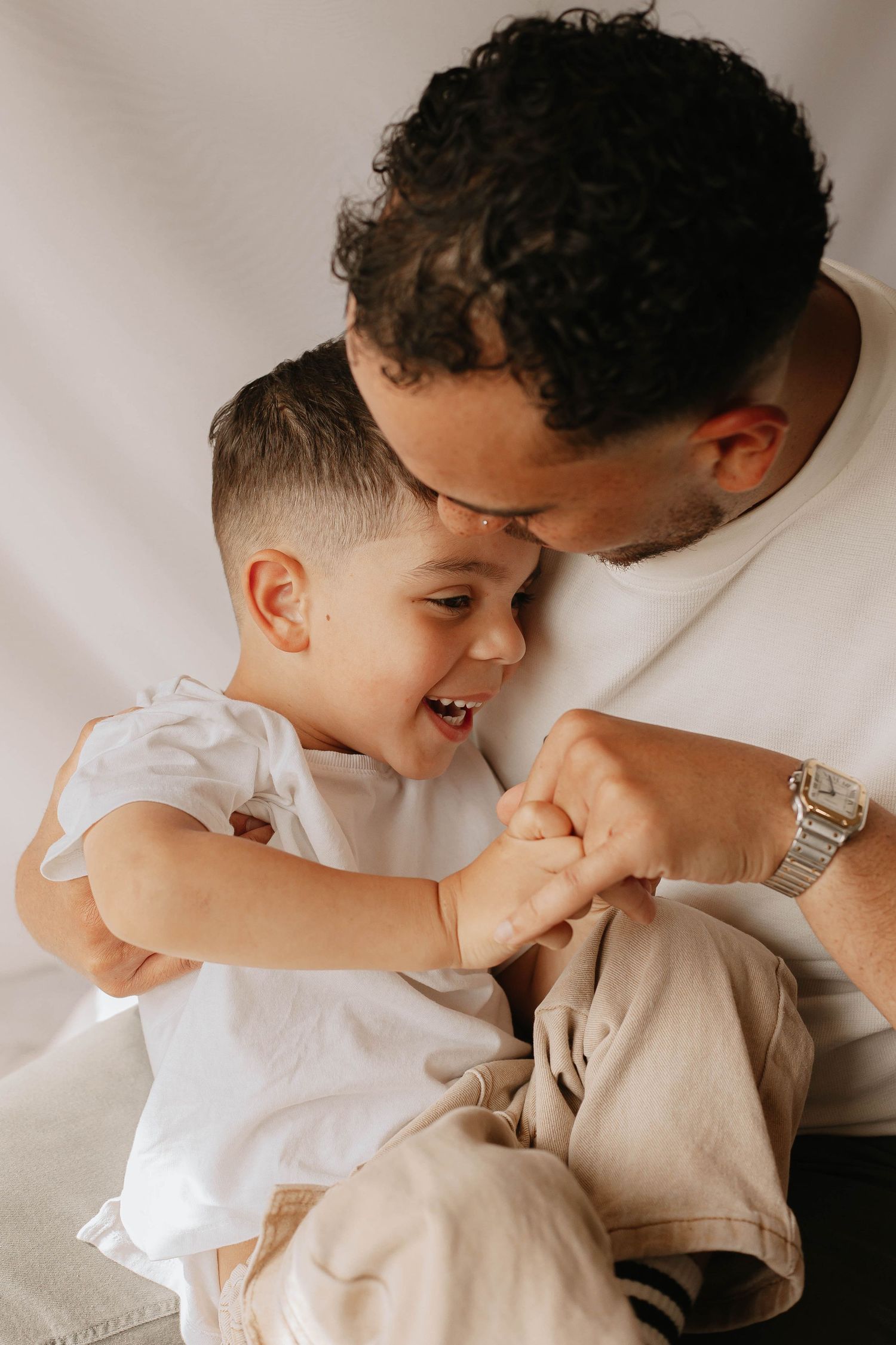 Father and son in Ashford newborn photoshoot