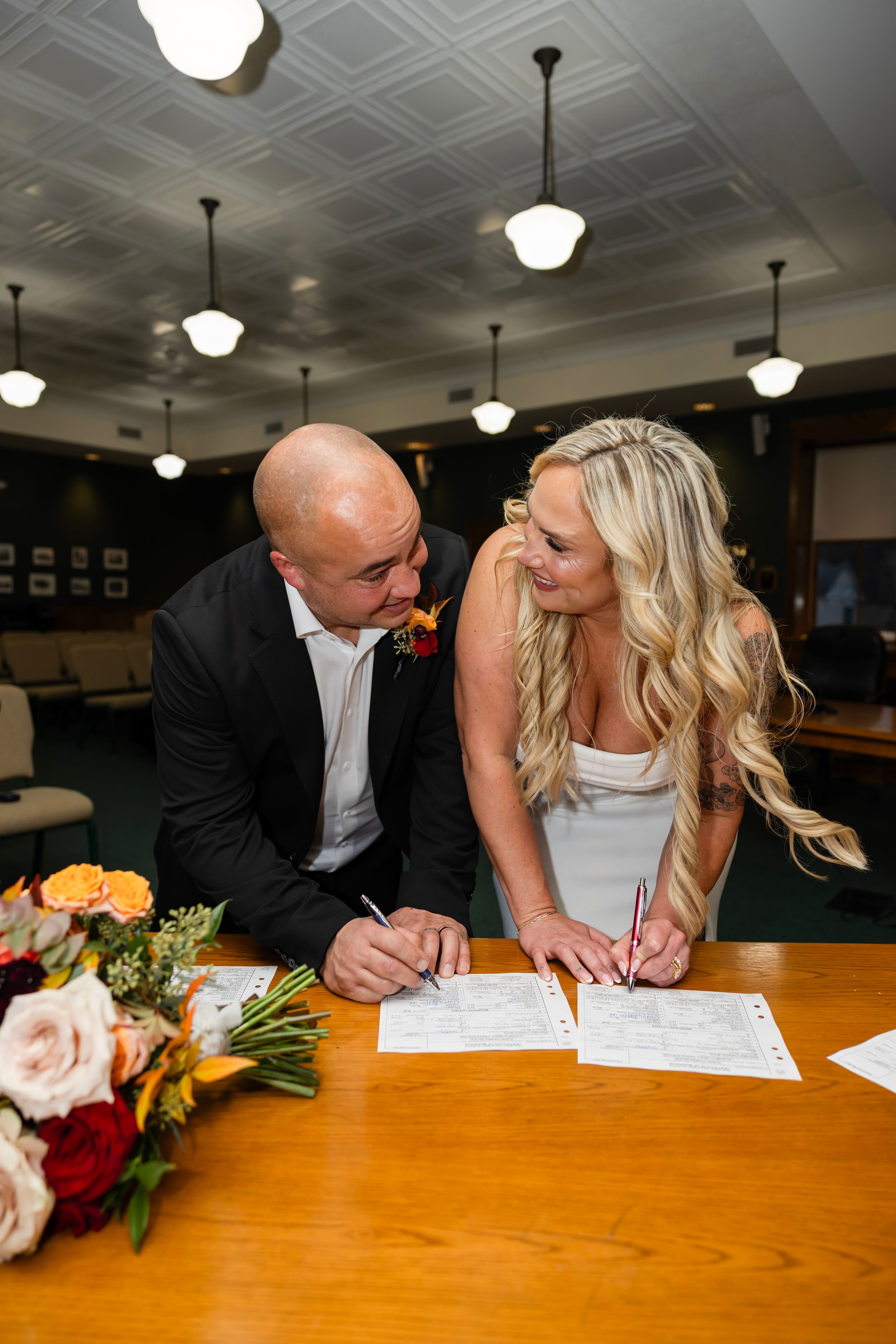 A couple signs their marriage license - Northern NJ wedding photographer