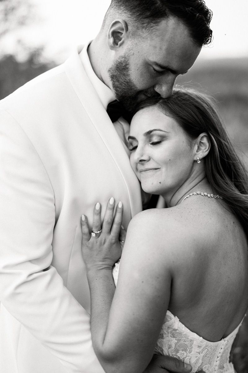 Romantic black and white portrait at their wedding at Ashley Farm in Yorkville, Illinois.