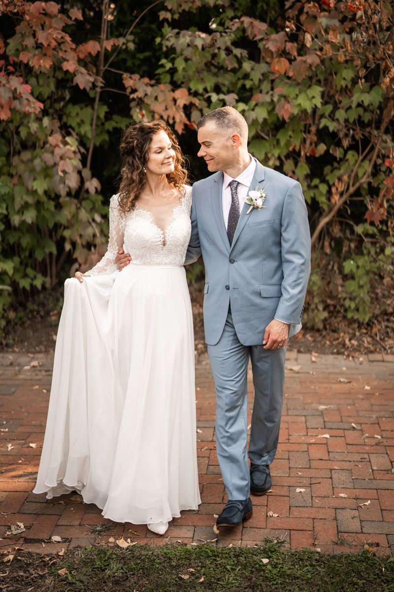 Fall portraits of bride and groom at Luthy Botanical Garden in Peoria, Illinois.