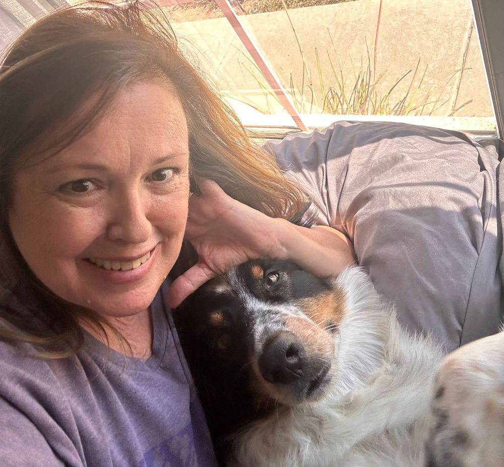 A series of five connected photos showing sweet moments between a person and their fluffy white dog on a couch.