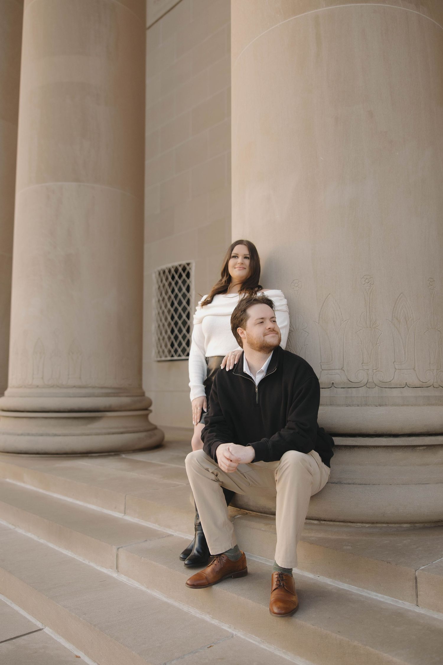 A series of connected photos showing a person sitting against classical stone columns in different poses.