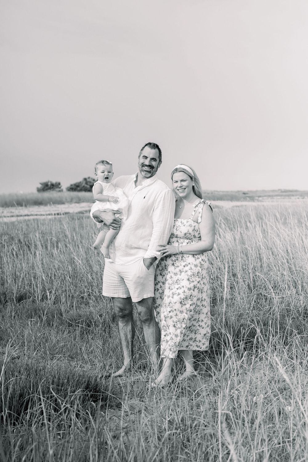 A series of candid photos showing people enjoying a sunny day in a grassy field.