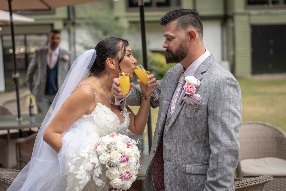 Elegant outdoor wedding photography with soft natural lighting and floral bouquet details.