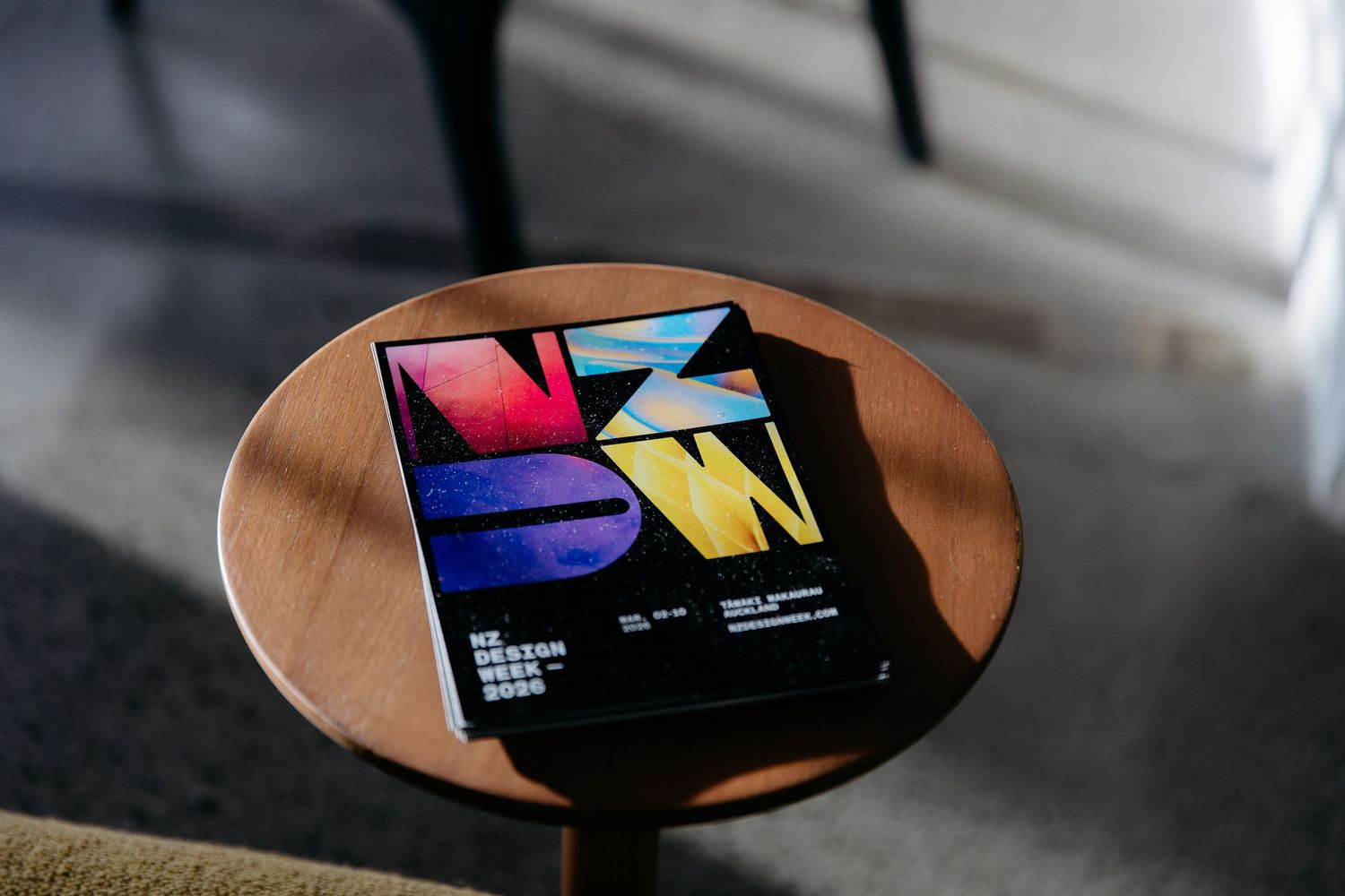 NZ Design Week flyers on display at a panel discussion event
