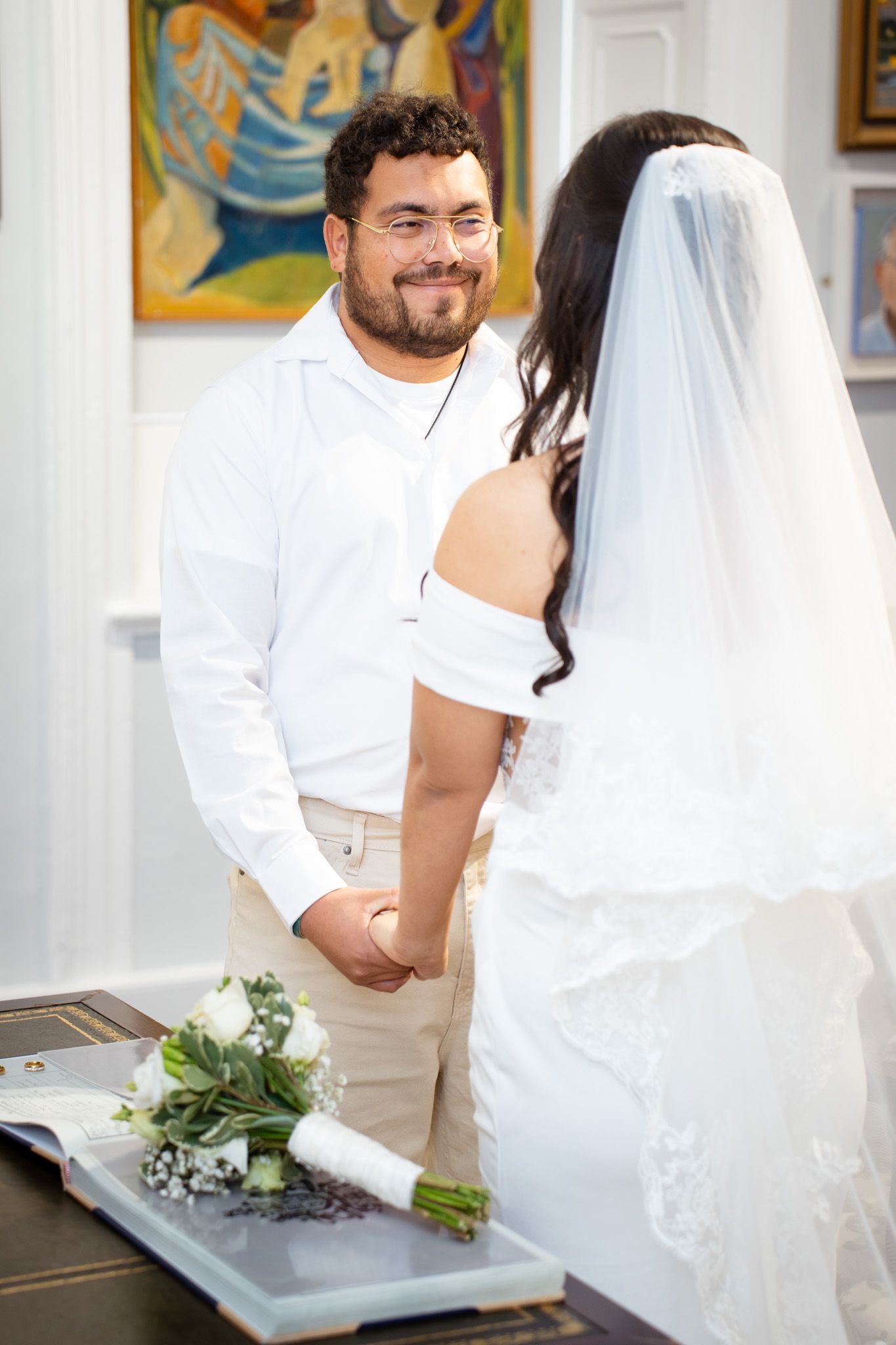 Wedding Day Gibraltar, groom smiles at bride