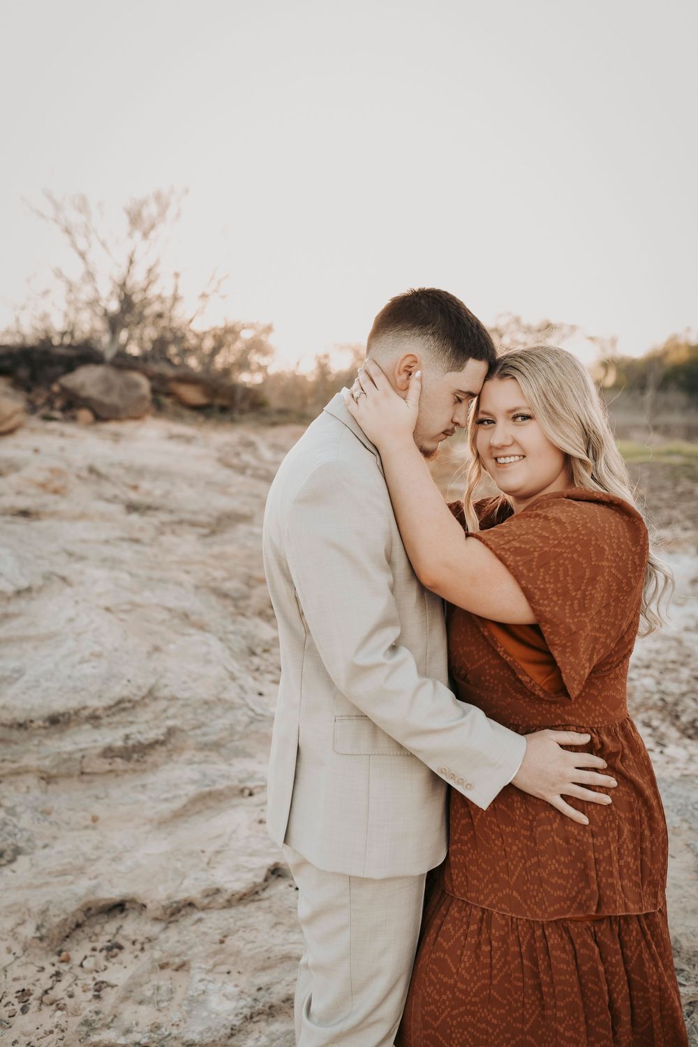 Romantic sunset engagement session near Grapevine Lake in Texas.