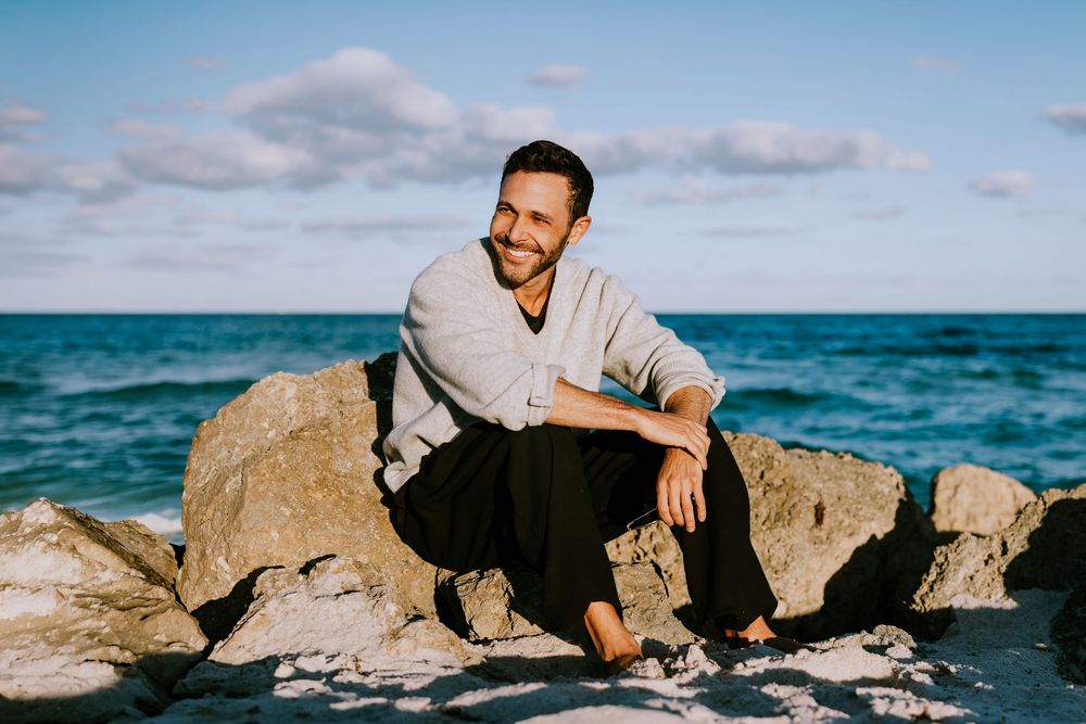 Miami dating photography portrait with confident natural expression, taken at sunset