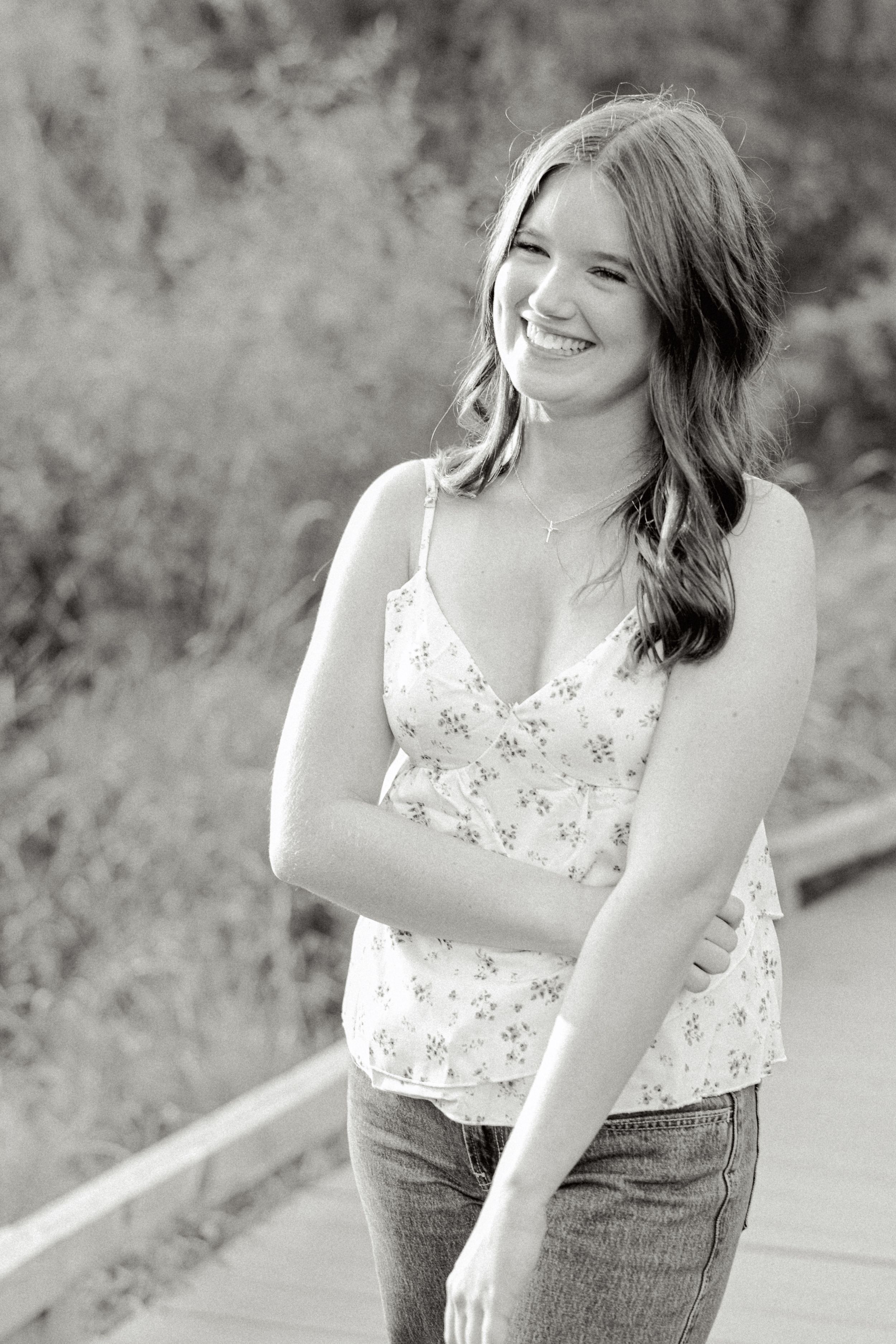 Black and white portrait series showing joyful expressions and casual style.