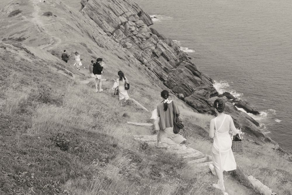 Wedding Ceremony at Torbay Point on the East Coast Trail captured by Newfoundland documentary style wedding photographer Kaitlyn yvette