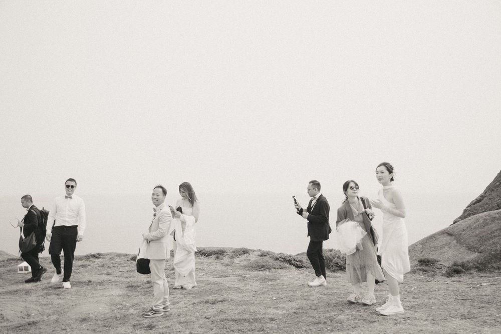 Wedding Ceremony at Torbay Point on the East Coast Trail captured by Newfoundland documentary style wedding photographer Kaitlyn yvette