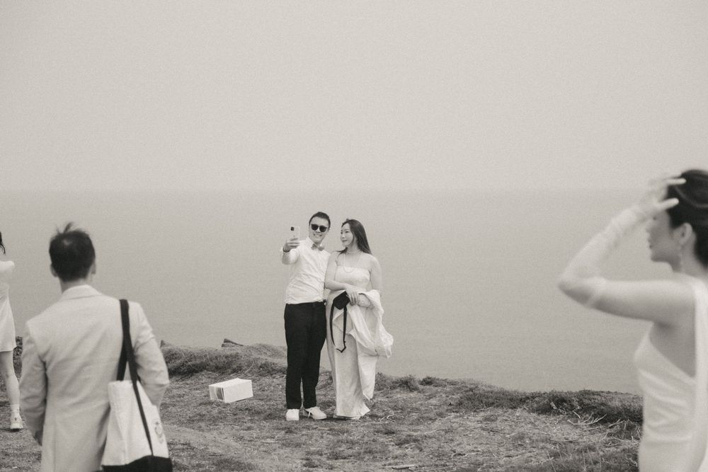 Wedding Ceremony at Torbay Point on the East Coast Trail captured by Newfoundland documentary style wedding photographer Kaitlyn yvette