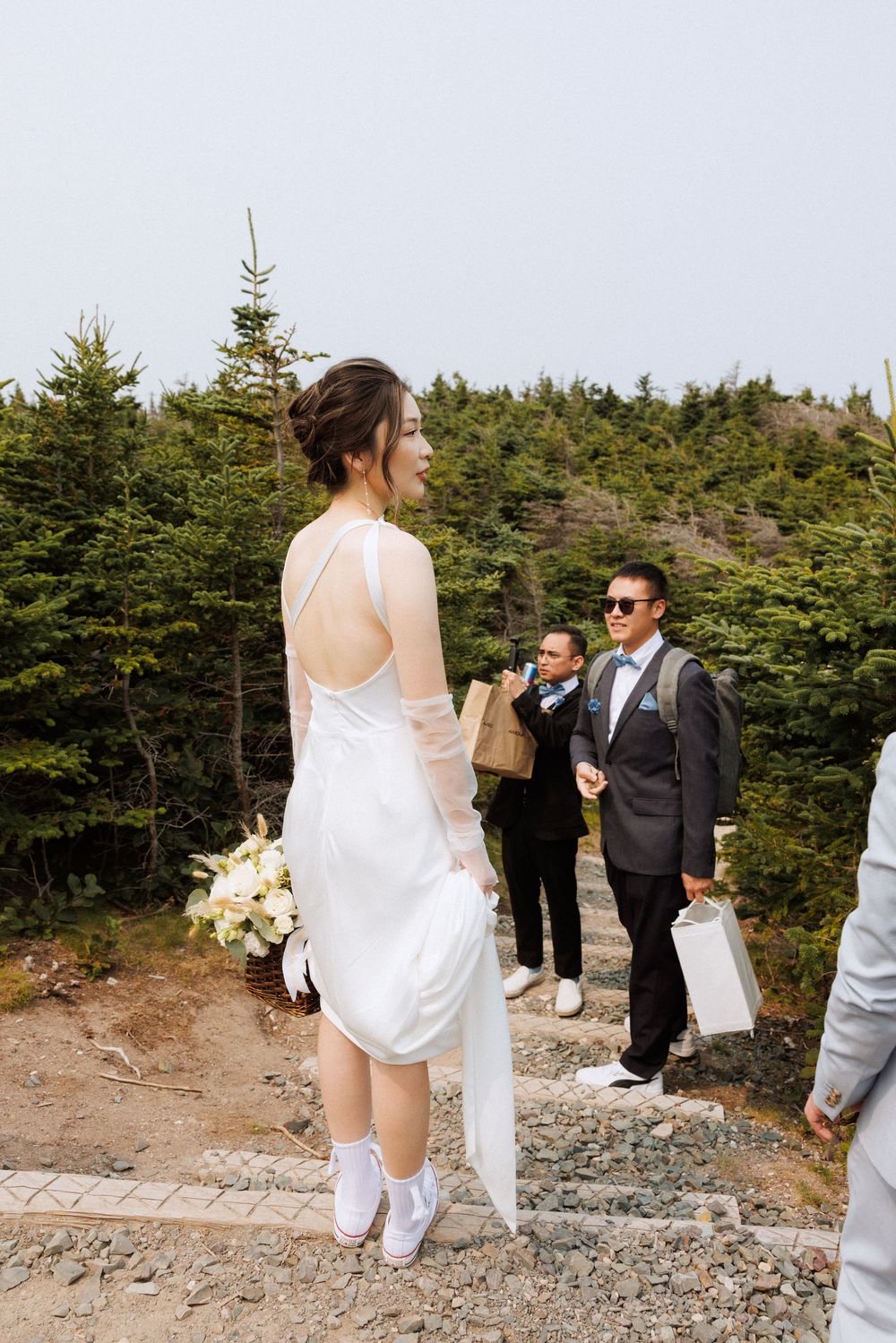 Wedding Ceremony at Torbay Point on the East Coast Trail captured by Newfoundland documentary style wedding photographer Kaitlyn yvette