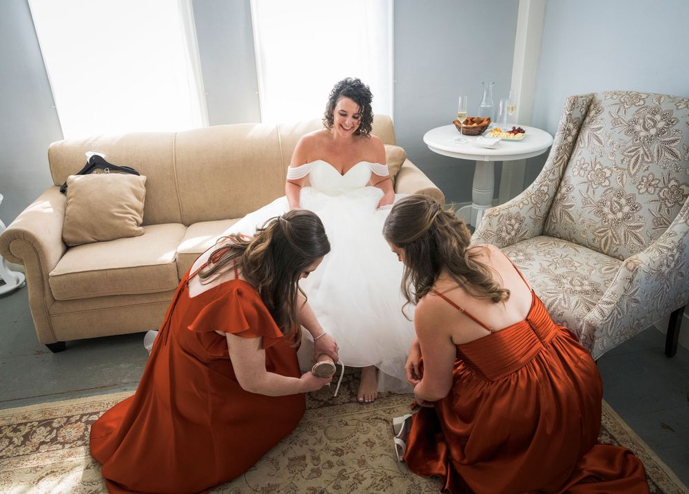A sequence of photos shows a person in a red dress sitting on a light-colored couch in a bright room.
