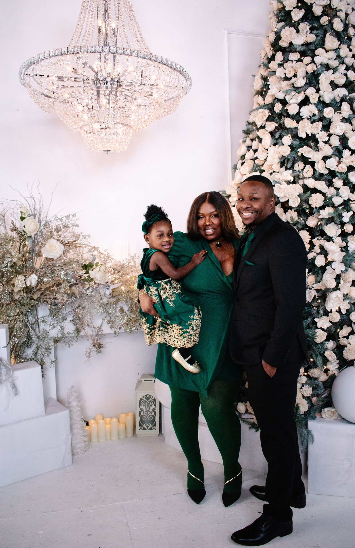 Tacoma family Christmas portraits at IAMCREATIVESPACE studio with elegant white and gold décor.