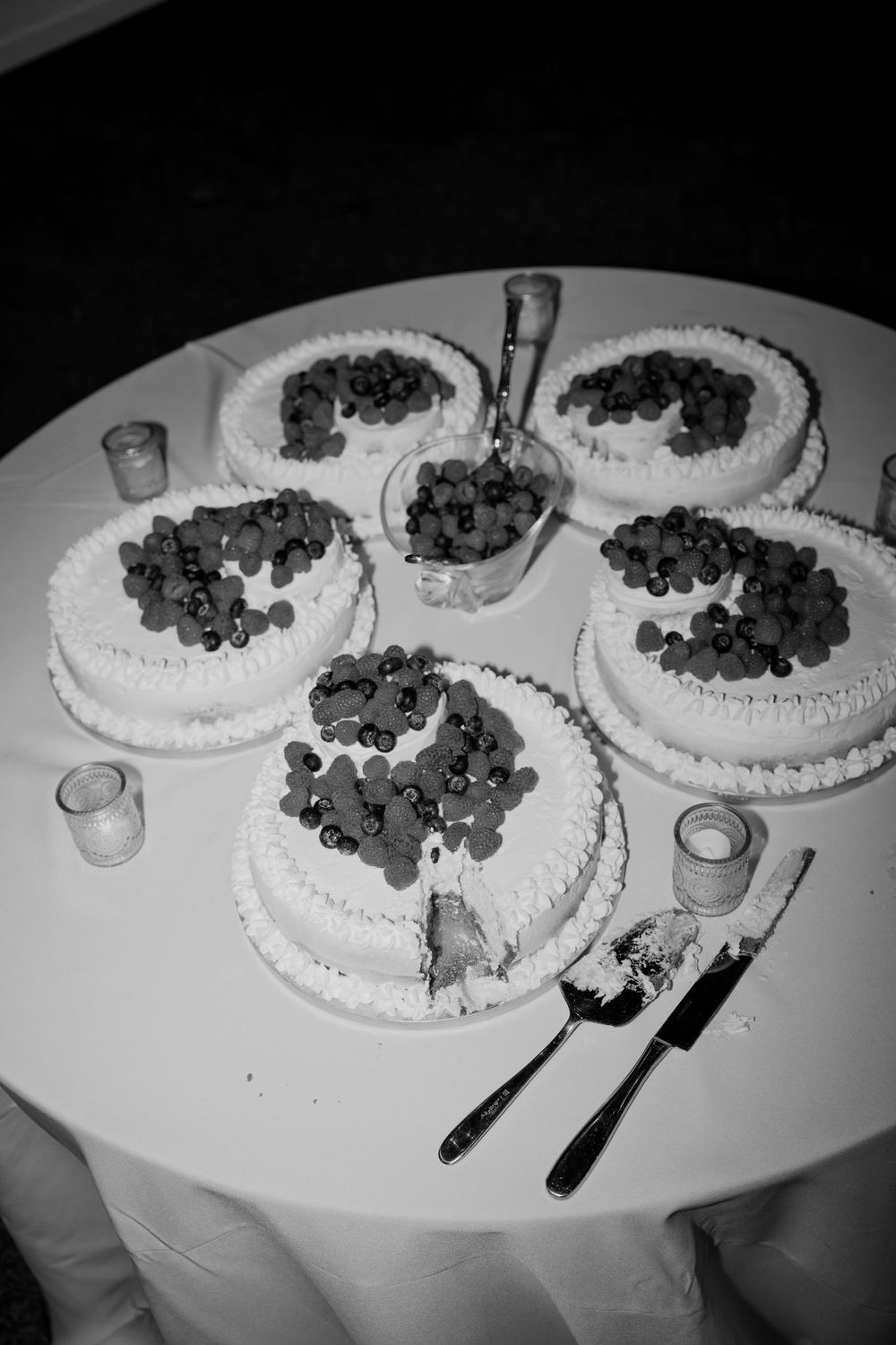 Black and white photo sequence showing plates of food being progressively eaten from left to right.