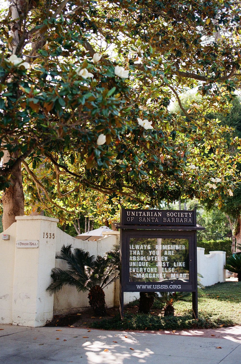 The front sign of the Unitarian Society of Santa Barbara shot on film with rich tones and grain.