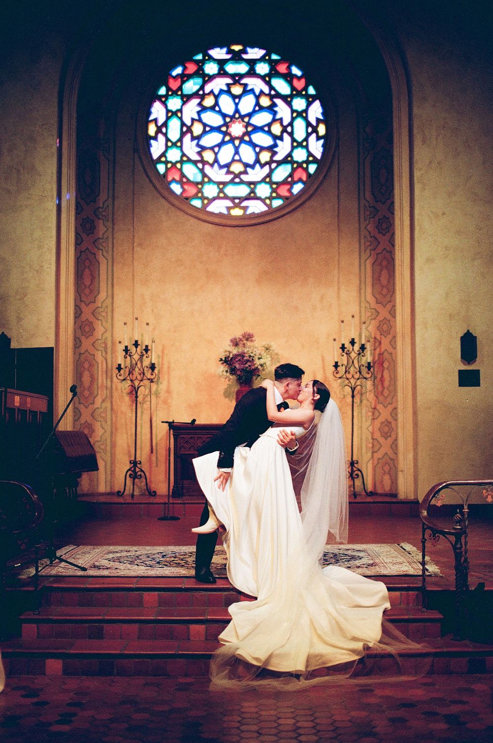 Film photography capturing the empty, dramatic aisle leading to the altar, highlighting the sense of history within the Unitarian Society.