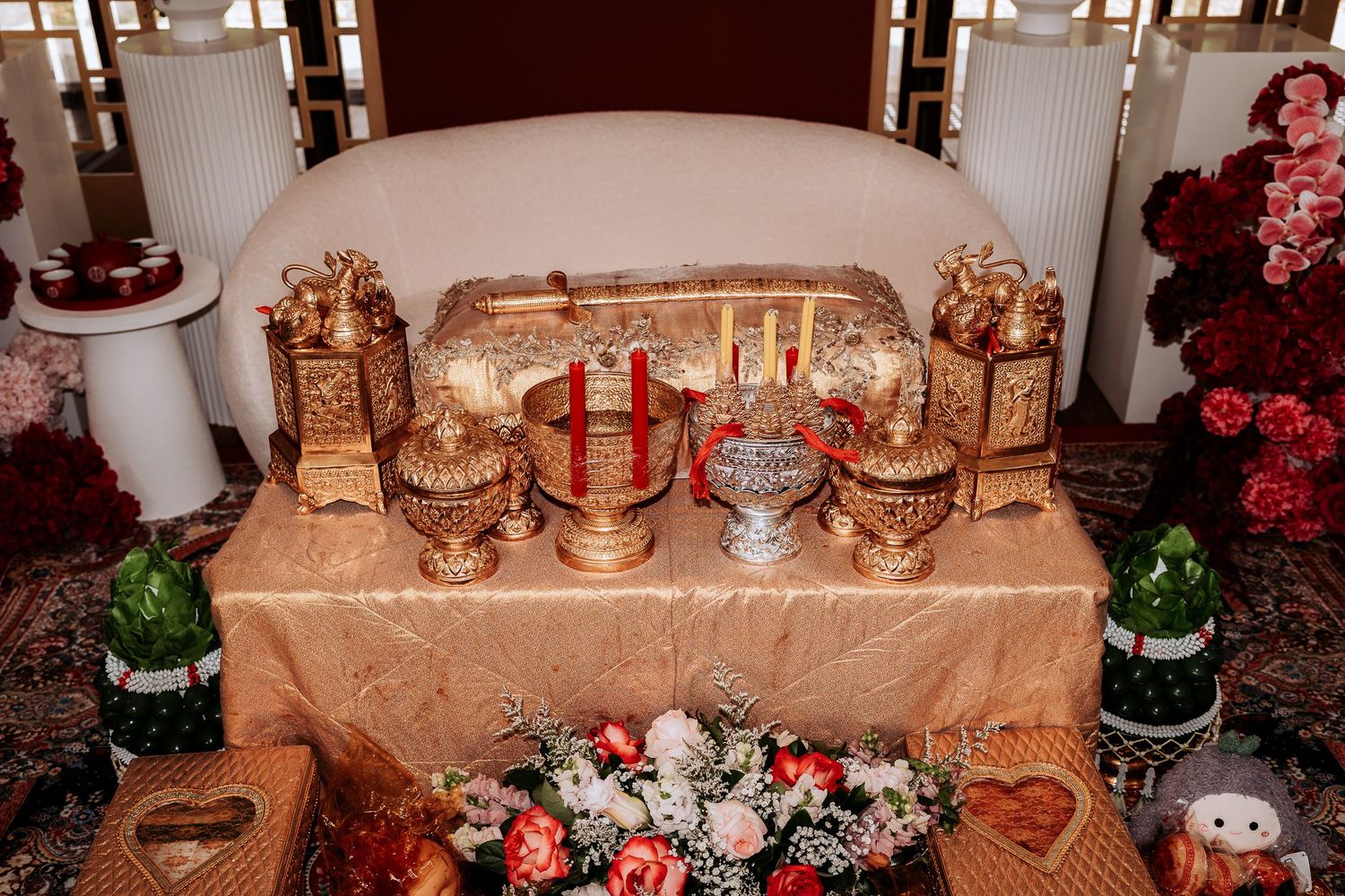 Elegant wedding reception table settings with copper and rose gold decor, floral arrangements, and romantic lighting.