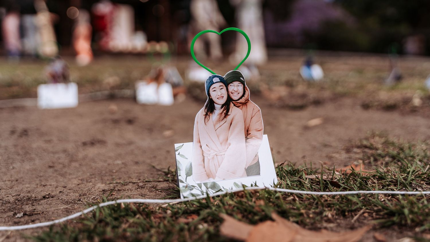 A series of six wedding photos showing outdoor ceremony details, floral arrangements, and decor elements.