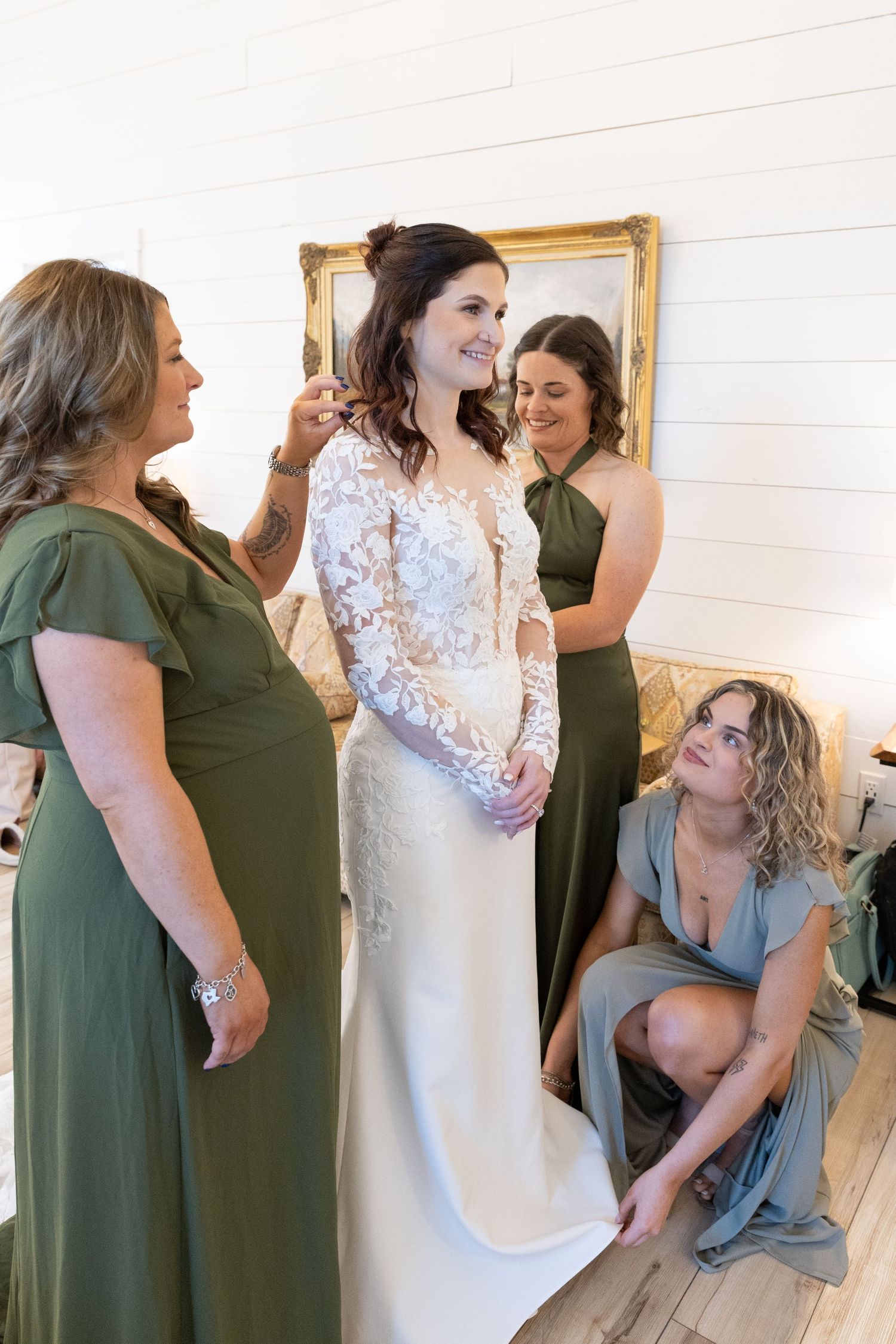 bridemaids helping bride