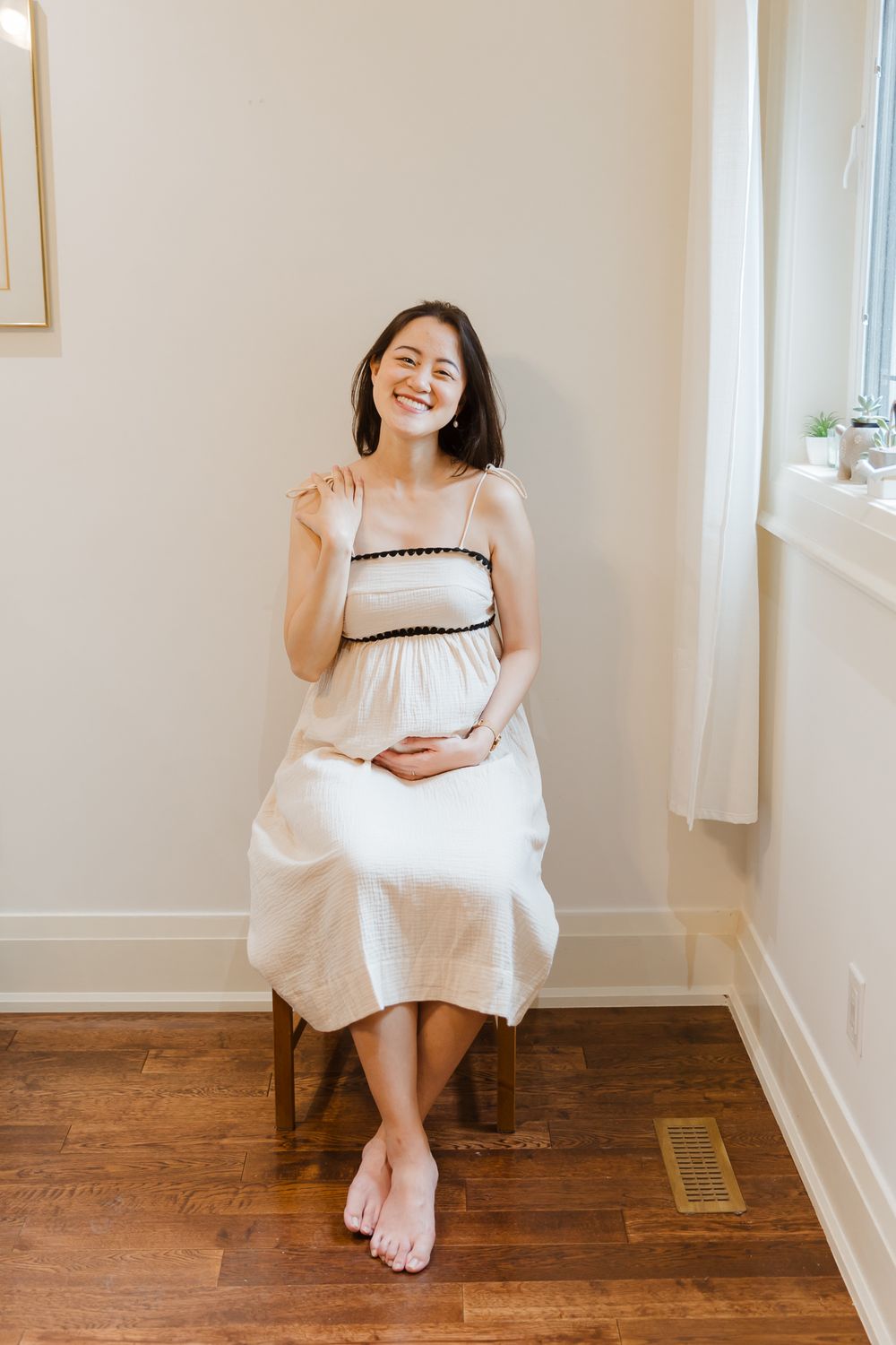 A series of photos showing someone in a white dress sitting on a chair against a white wall with hardwood floors.