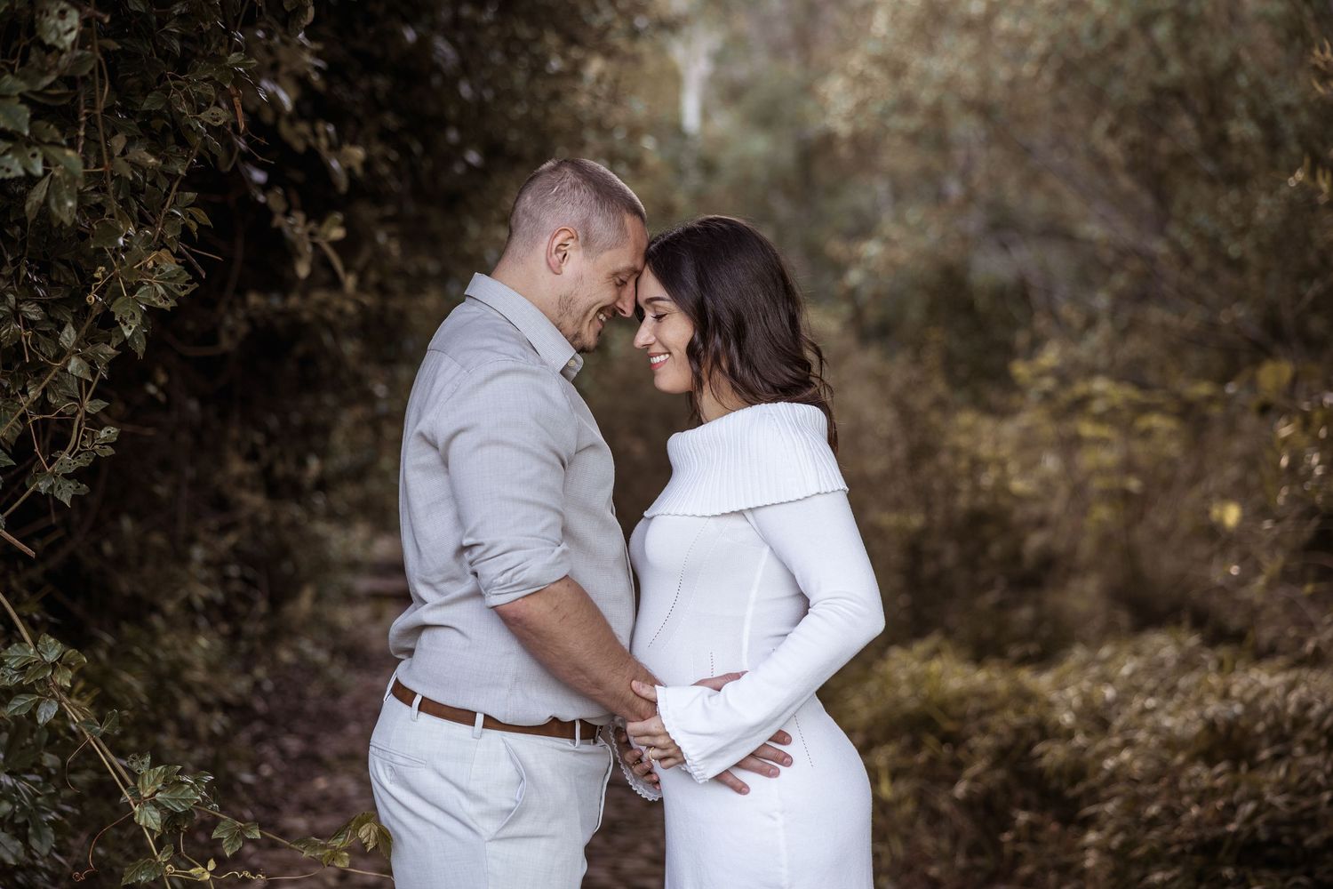 close up of mothers pregnant belly during maternity photoshoot in cape town By Grace Photography