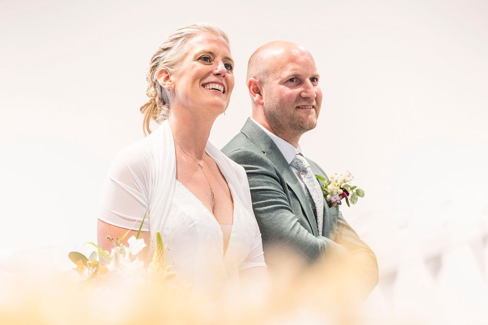 Soft-focus wedding photography series in natural sunlight.