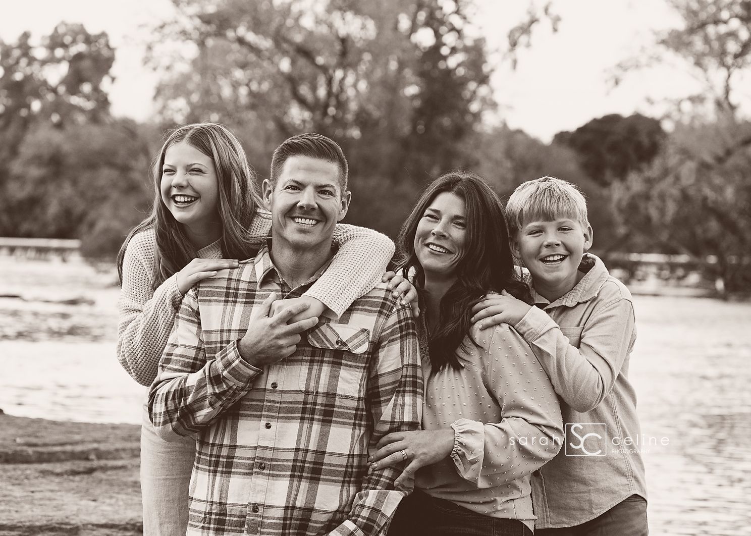 A black and white photo series showing a family enjoying candid moments together outdoors.