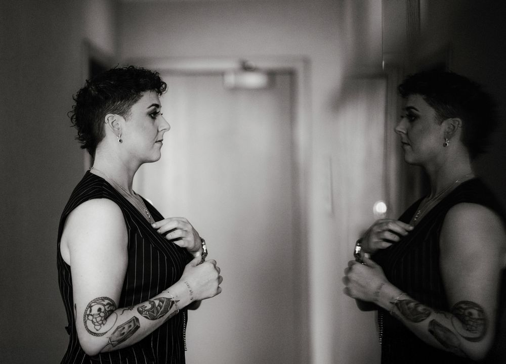 A series of black and white profile shots showing two people in an animated conversation.