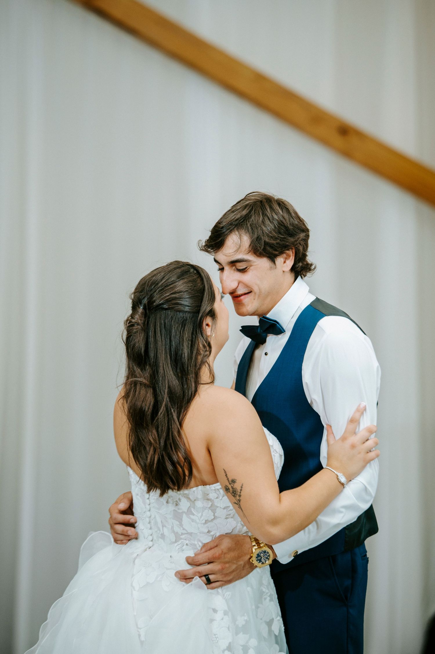 Romantic wedding couple sharing intimate moments in a sequence of tender embraces.
