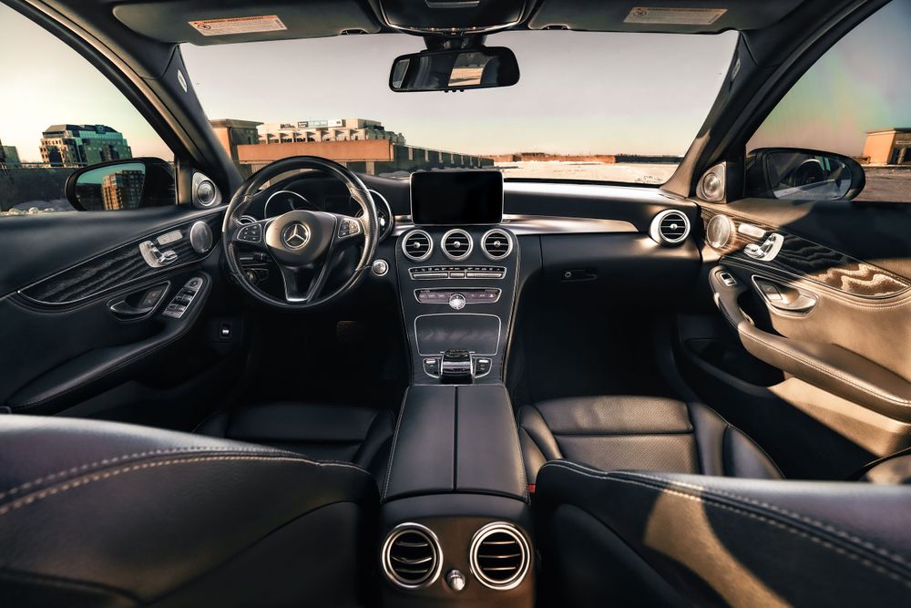 Modern Mercedes-Benz interior featuring digital displays and premium leather dashboard. Mtlshutter photography