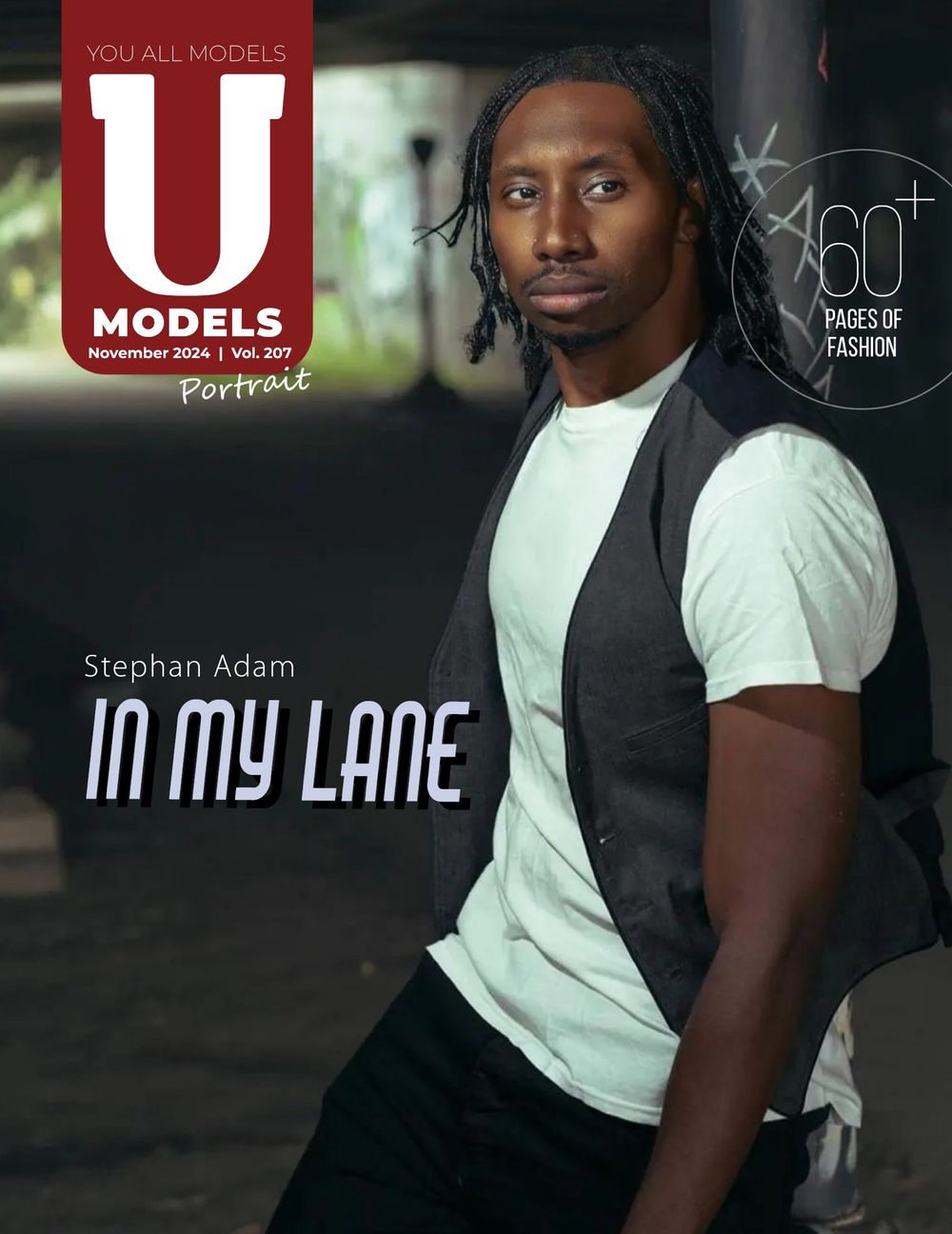 Magazine cover featuring a model in a white t-shirt and dark vest against a dark background.