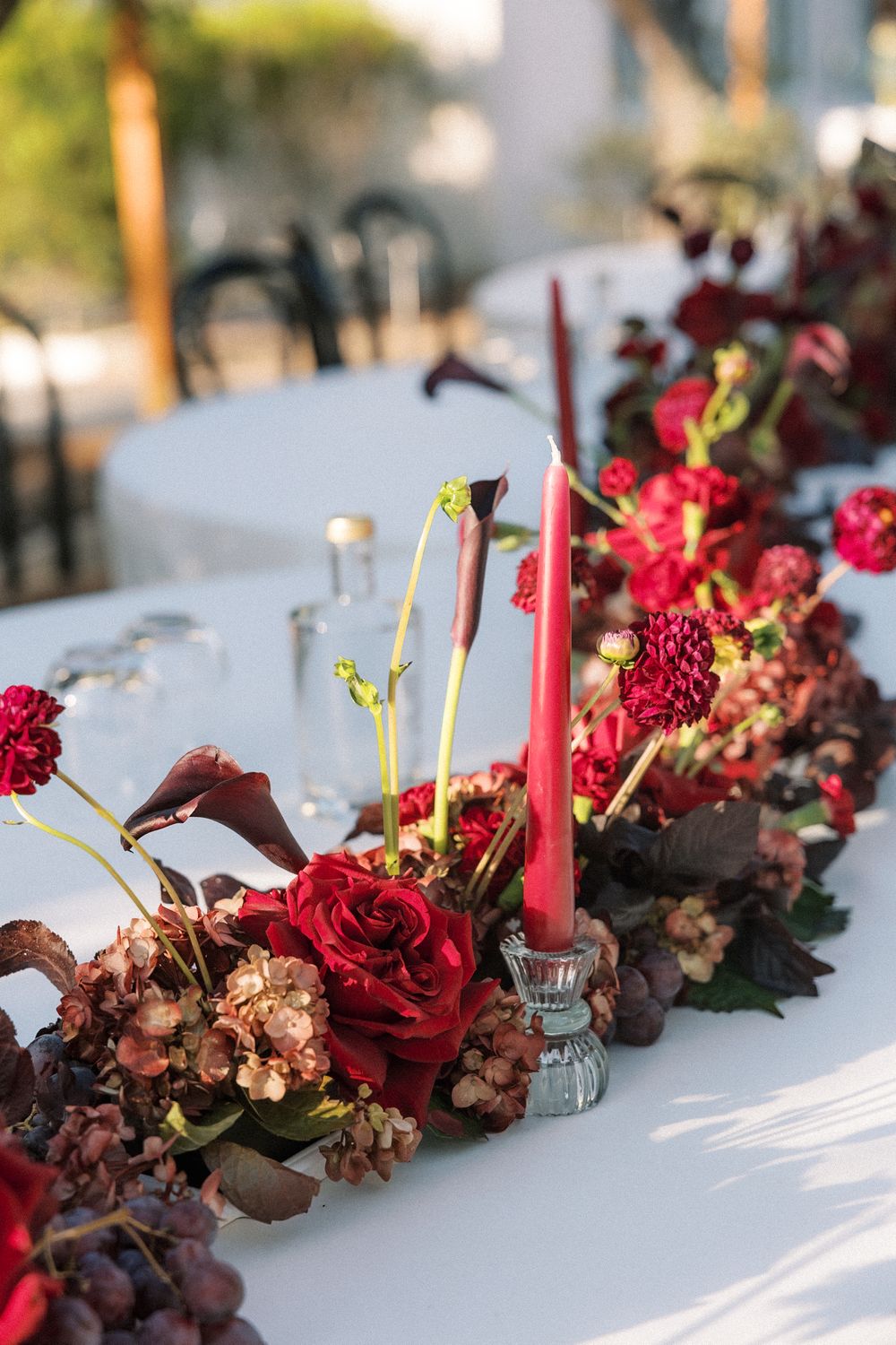 floral centrepieces at Indian wedding reception in Portugal